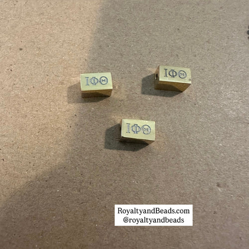 Small Iota block charms.