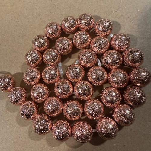 Rose gold rocks beads 10mm.