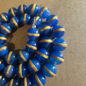 Blue and gold stripe beads