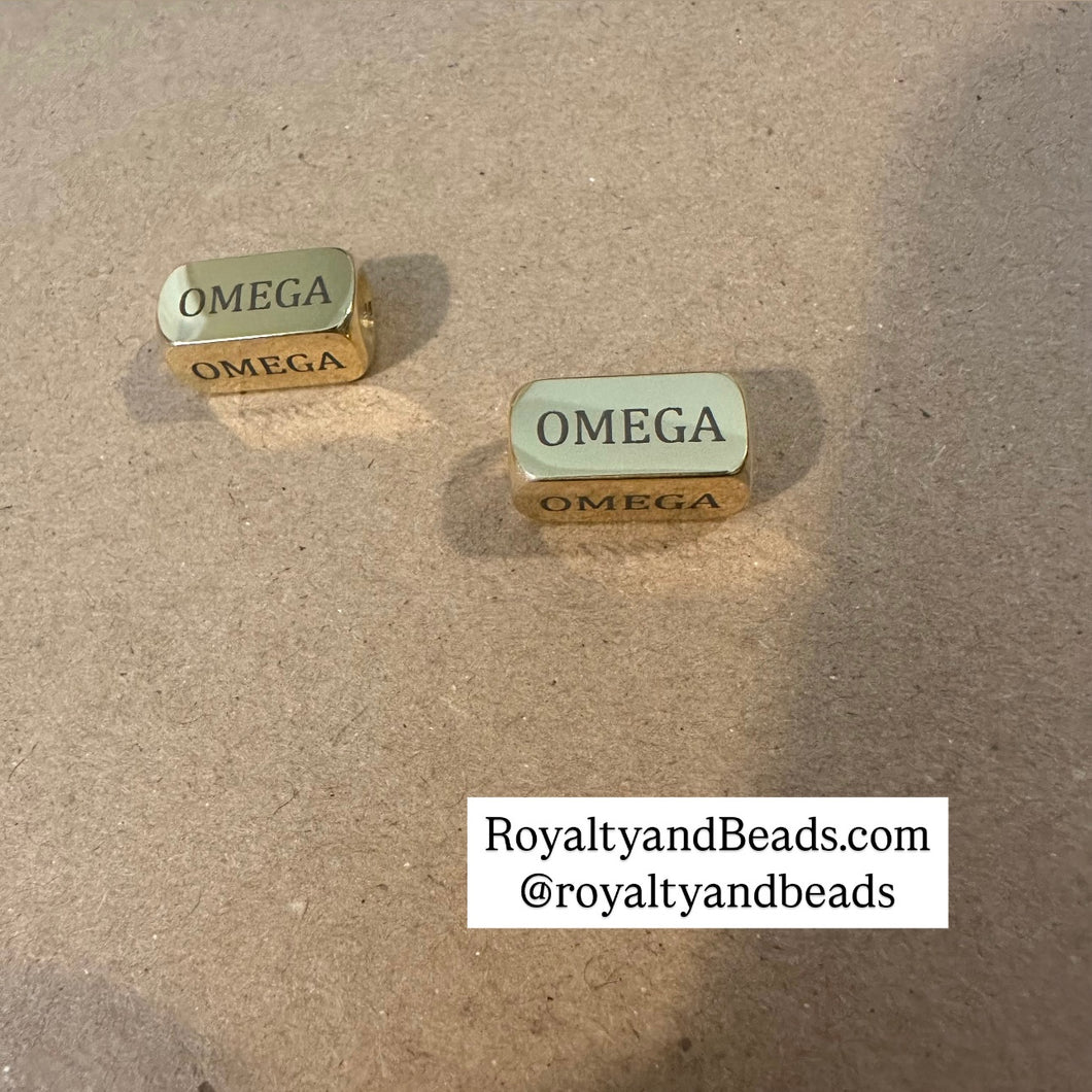 Omega charm. (Gold)