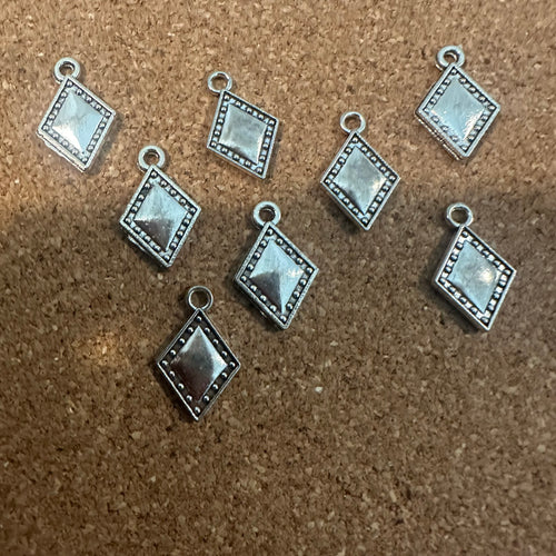8 silver diamond charms.