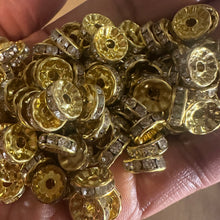 Load image into Gallery viewer, 50 gold rondelle spacers.