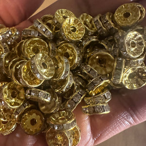 50 gold rondelle spacers.