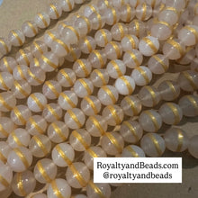 Load image into Gallery viewer, Clear and gold stripe beads
