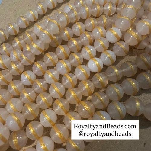 Clear and gold stripe beads