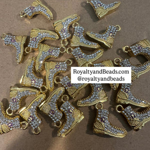 Gold Omega boot charm.