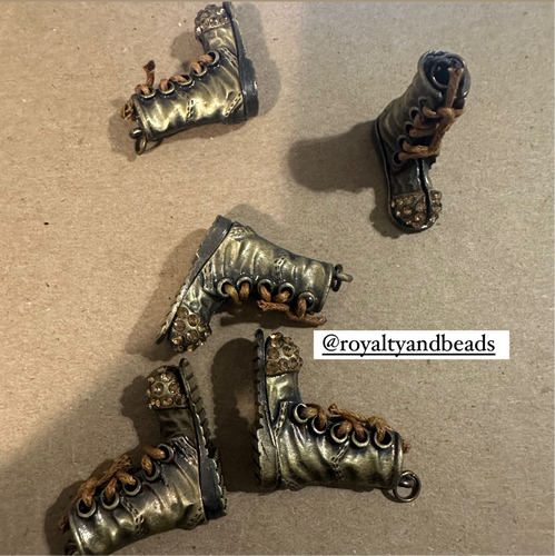 Bronze boot charms.