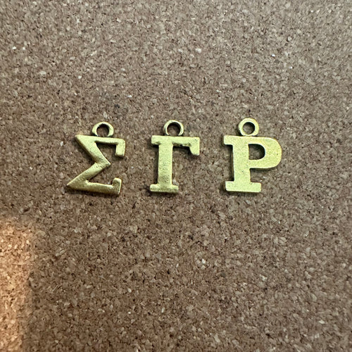 3 Sigma letter charms.