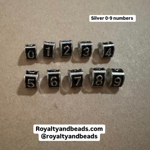 Silver number charm set.