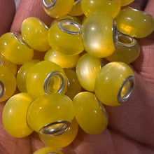 Load image into Gallery viewer, 10 yellow big hole beads.