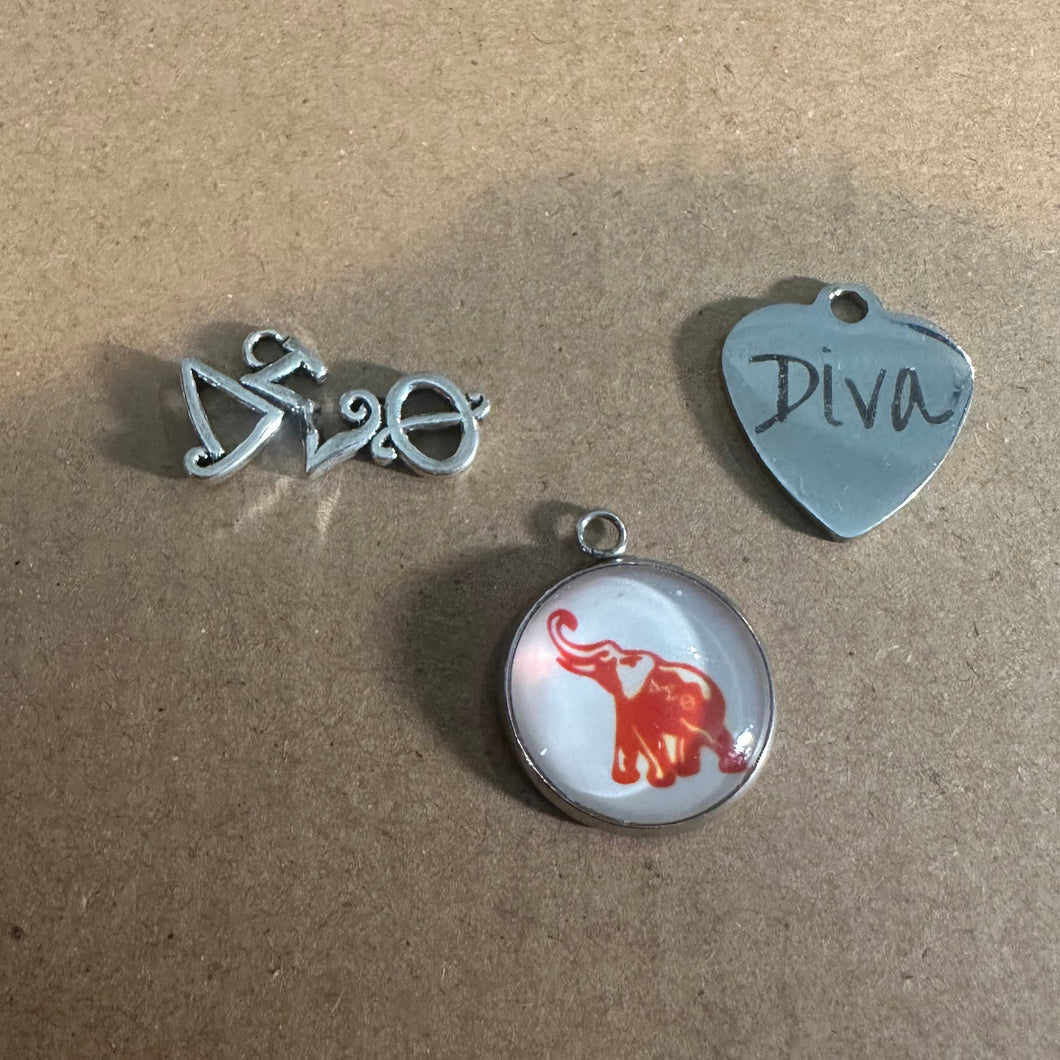 3 Delta charms*