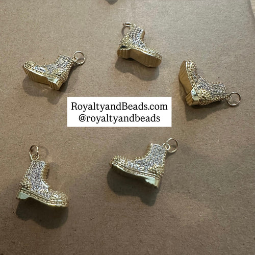 Gold boot charm.