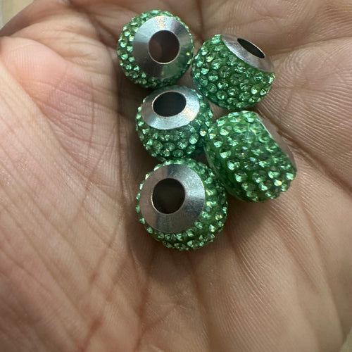 5 green big hole beads.
