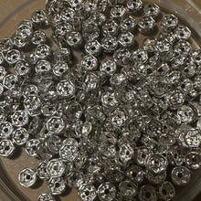 Load image into Gallery viewer, 50 clear and silver rondelle spacers. 6mm