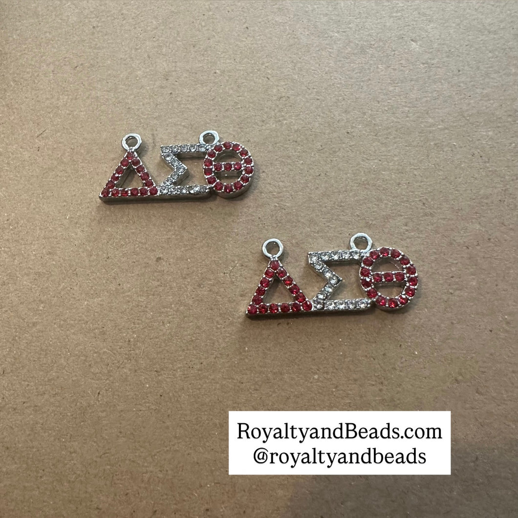 Micro pave Delta charm.