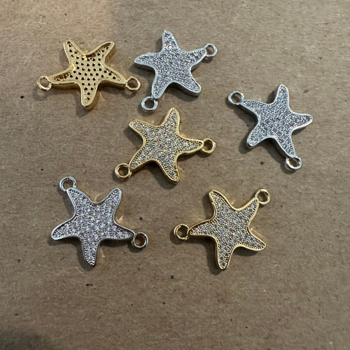 Pave star connector charm.