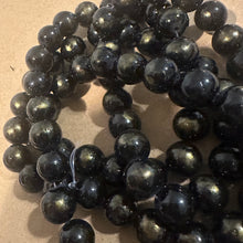 Load image into Gallery viewer, Black and gold beads