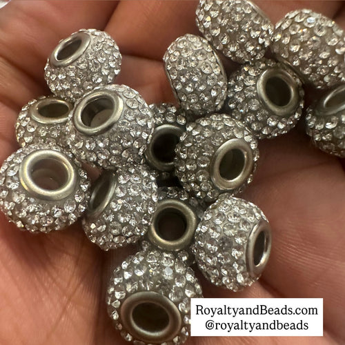5 clear big hole beads.