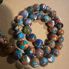 Load image into Gallery viewer, Mixed orange beads.