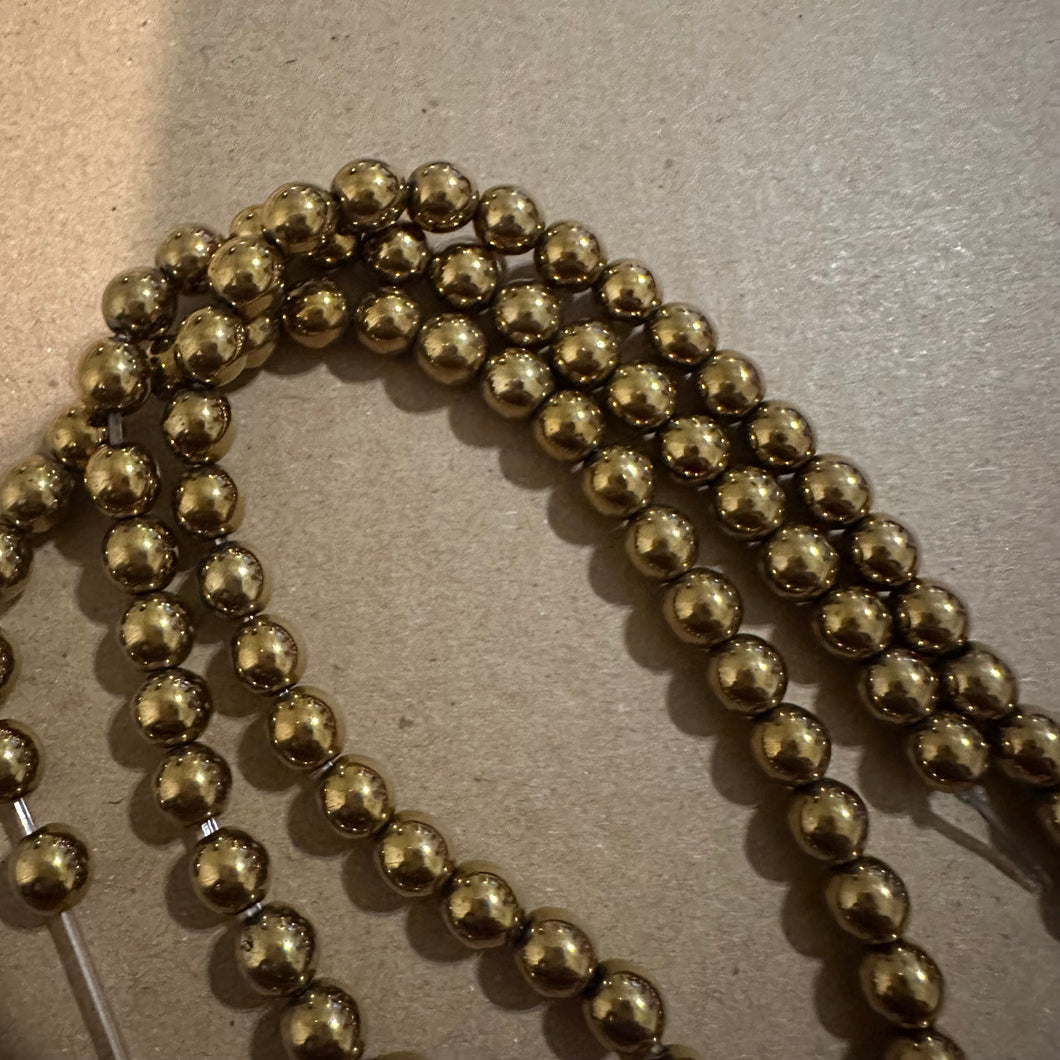 Gold hematite beads 6mm