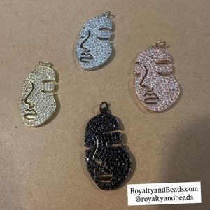 Pave face charms.