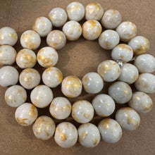 Load image into Gallery viewer, White and gold beads