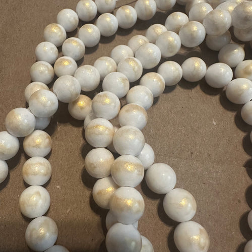 White and gold beads.