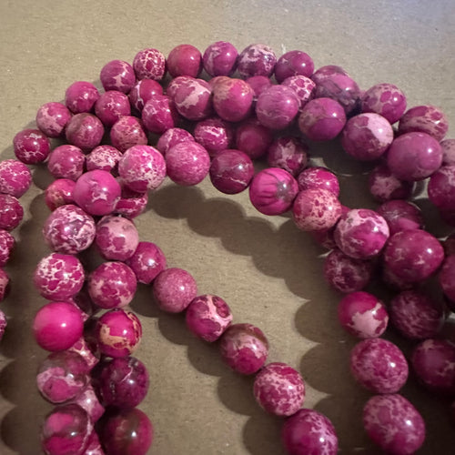 Pink and tan beads.