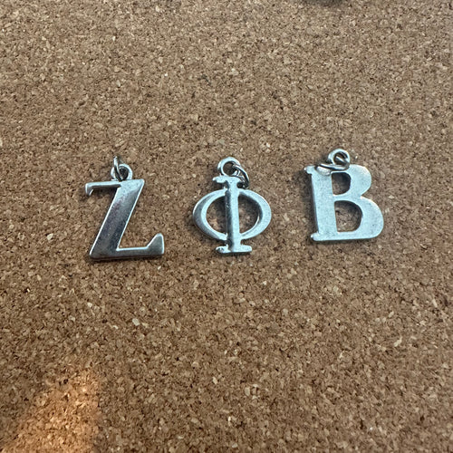 3 Zeta letter charms.