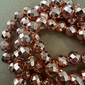 Faceted rose gold beads