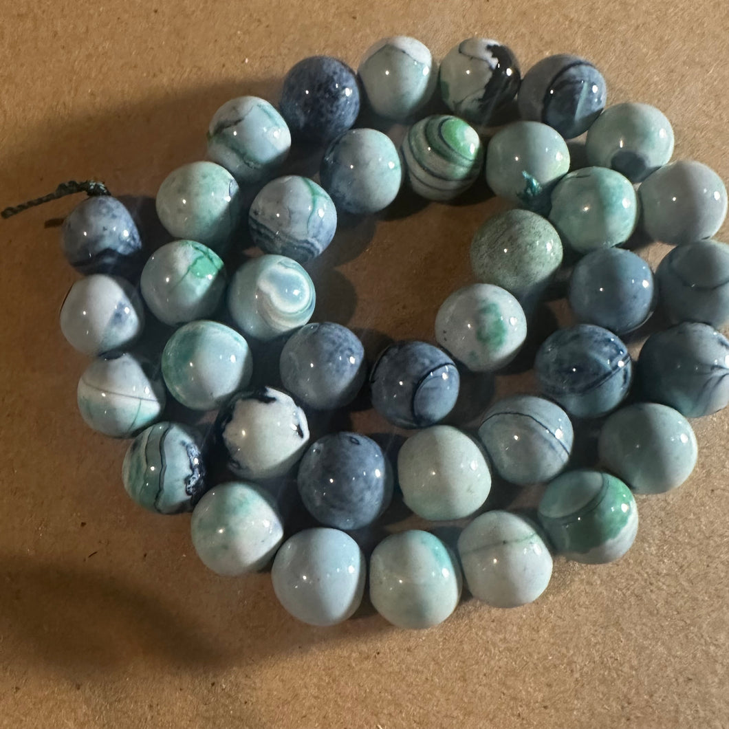 Green and black agate beads