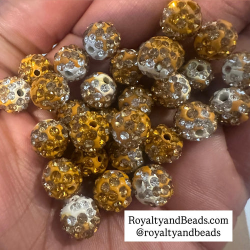 20 yellow mixed pave beads.