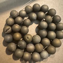 Load image into Gallery viewer, Gold druzy beads.