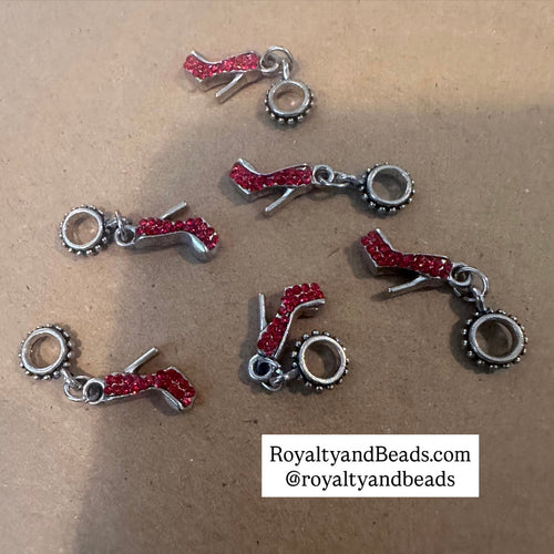 5 red heel shoe charms.