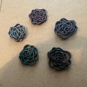 Pave rose charms.
