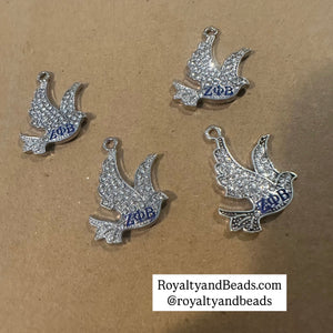 Rhinestone dove charms.
