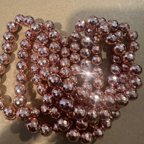 Faceted rose gold beads