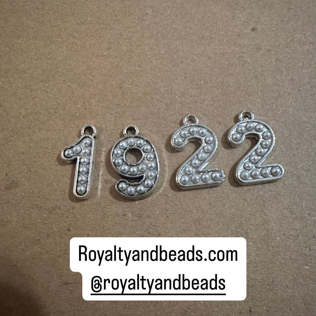 1922 number charm set.