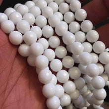 Load image into Gallery viewer, Faceted white beads 8mm