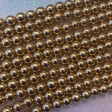 Load image into Gallery viewer, Gold hematite beads 8mm