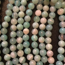 Load image into Gallery viewer, Blue agate beads.