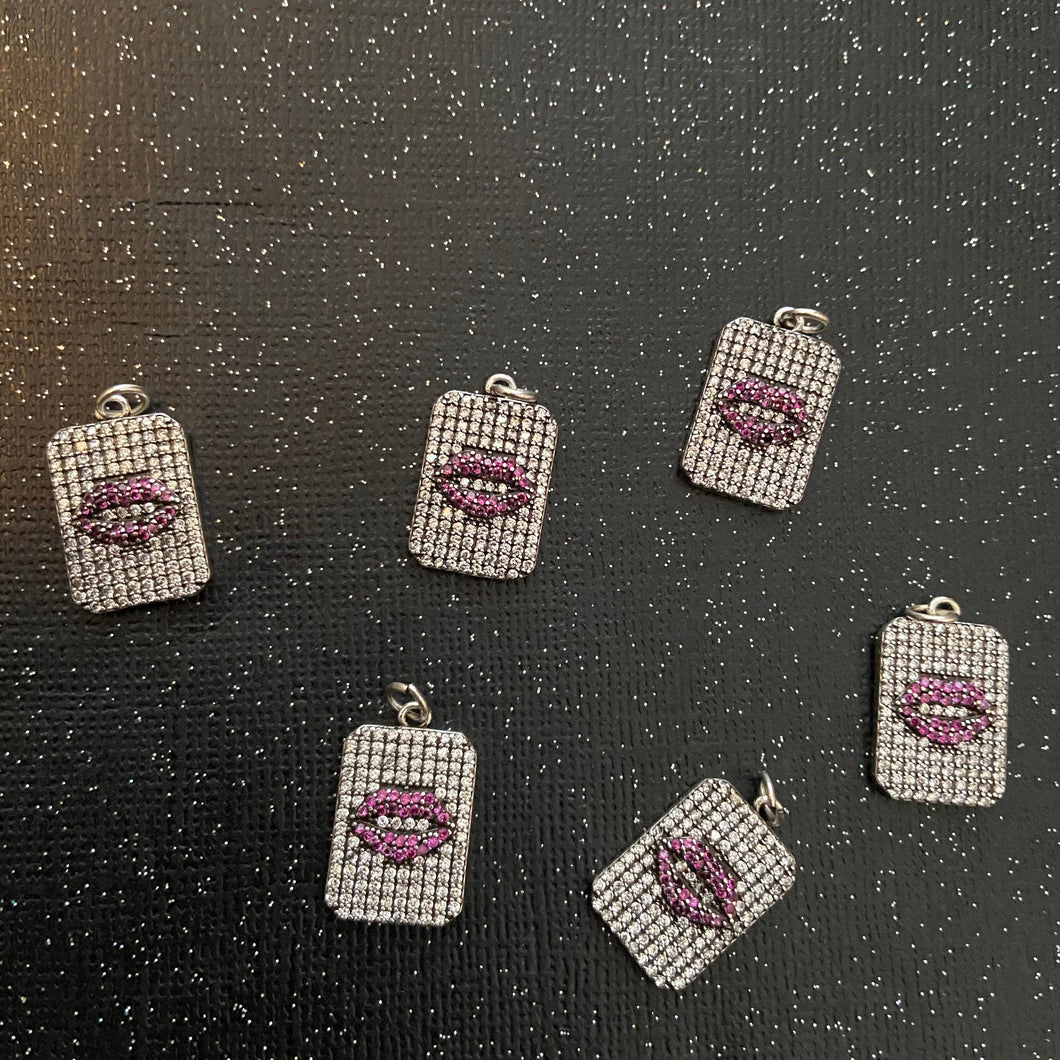 Pink lip charms.