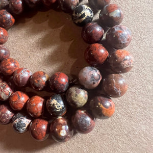 Brown and orange beads 8mm.