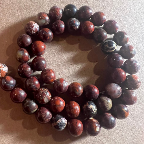 Brown and orange beads 8mm.