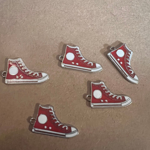 Red tennis shoe charms.