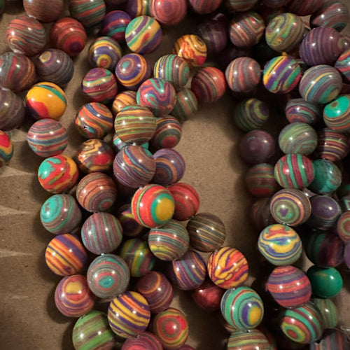 Purple and red swirl beads