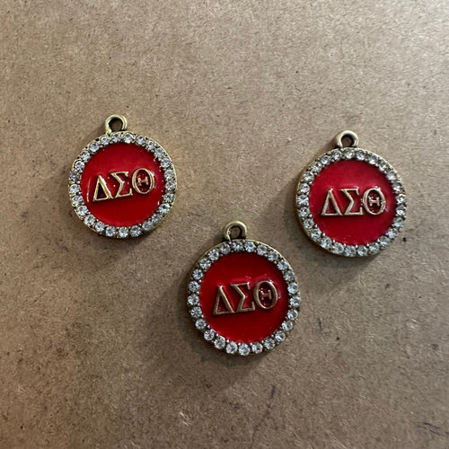 Gold Delta charm