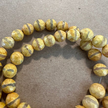 Load image into Gallery viewer, Faceted yellow beads 8mm