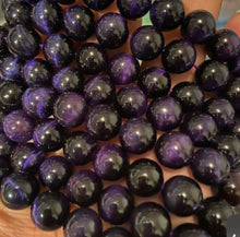 Load image into Gallery viewer, Purple Tigers eye beads.