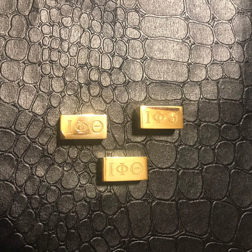 Iota Phi Theta charm.